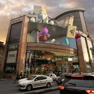 Shopping Goods Emerge from Screen in a fake-out-of-home ad of Palladium