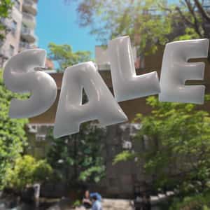 Sale Inflatables Emerge from Screen in a fake-out-of-home ad of Victoria's Secret 
