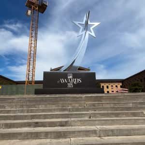 Crane Drops Trophy at Landmark in a fake-out-of-home ad of BET