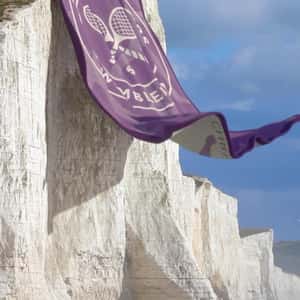 Towel Hangs Like Curtain on Cliff in a fake-out-of-home ad of Christy