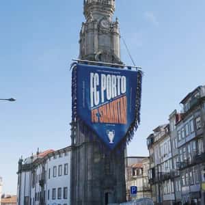 Banner Waves at Church Tower in a fake-out-of-home ad of FC Porto