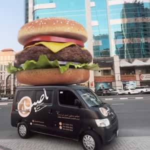 Burger Above Delivery Van in a fake-out-of-home ad of Aseel Restaurant