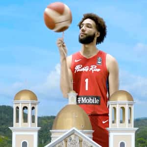 Giant Players Tossing Basketball in a fake-out-of-home ad of T-Mobile
