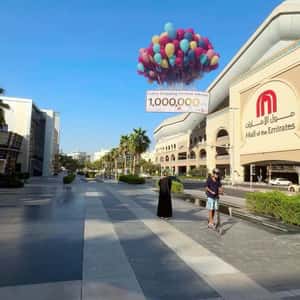 Gift Check Carried by Balloons in a fake-out-of-home ad of Mall of the Emirates