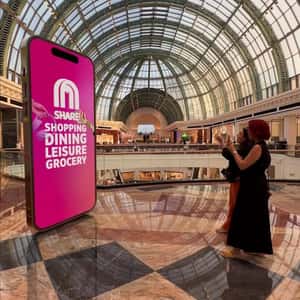Robot Gives Rewards from Phone in a fake-out-of-home ad of Mall of the Emirates