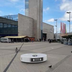 Vacuum Cleaner Sweeps City Square in a fake-out-of-home ad of Dreame