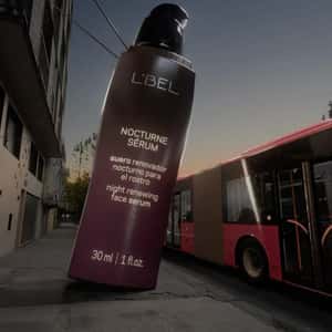 Bottle Pours Serum on Bus in a fake-out-of-home ad of L'BEL
