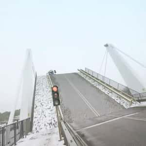 Monster Truck Soars Off the Bridge in a fake-out-of-home ad of LEGO