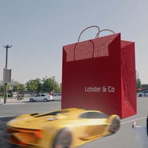 Sports Car Drifting Around Paper Bag in a fake-out-of-home ad of Lobster & Co