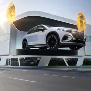 Building Parts to Reveal an SUV in a fake-out-of-home ad of Mercedes-Benz