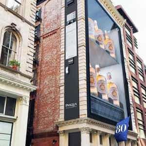 Wine Vending Machine on Building Facade in a fake-out-of-home-ad of Pasqua