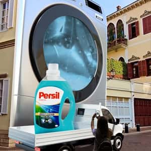 Washing Machine Releases Flowers in a fake-out-of-home ad of Persil