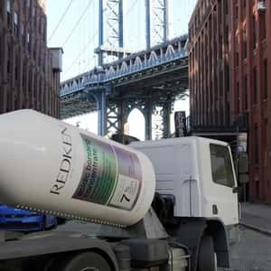 Shampoo Mixer Truck Fixes Potholes in a fake-out-of-home ad of RedKen