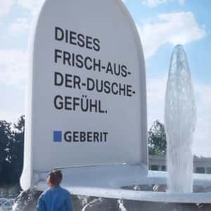 Toilet Bowl Installation on Fountain in a fake-out-of-home ad of Geberit