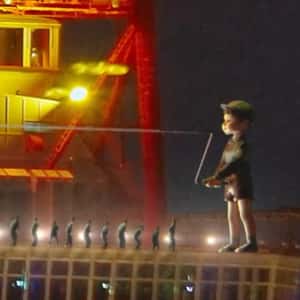 Playing Jumping Rope at Eiffel Tower in a fake-out-of-home ad of Netflix