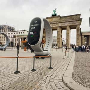 Runners on Smartwatch Treadmills in a fake-out-of-home ad of Xiaomi