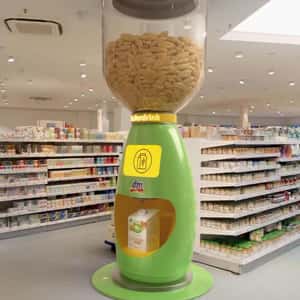 Dispenser Grinds Oats into Milk in a fake-out-of-home ad of DM