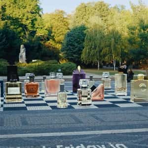 Perfumes on Ground Chessboard in a fake-out-of-home ad of Sephora