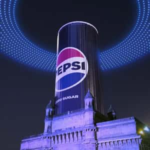 Can Inflates at Gateway to India in a fake-out-of-home ad of Pepsi