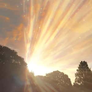 Golden Light Emanates from the Sun in a fake-out-of-home ad of Astrid & Miyu