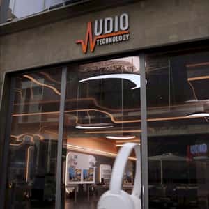 Headphones Exits Store in a fake-out-of-home ad of Audio Technology