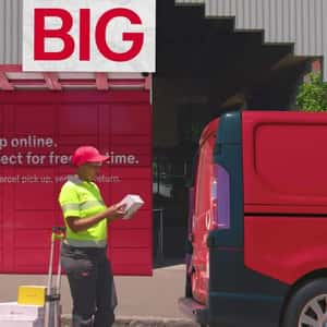 Extended Delivery Van on Street in a fake-out-of-home ad of Australia Post
