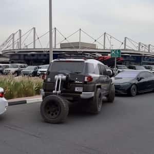 Land Cruiser Parked with Spare Tire in a fake-out-of-home ad of Automax