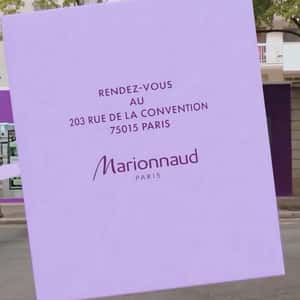 Lilac Bow Adorns Eiffel Tower in a fake-out-of-home ad of Marionnaud