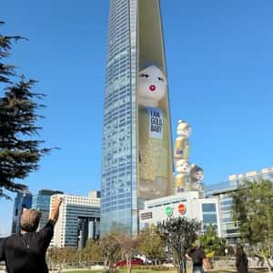 Tower Unveils Perfume Bottle in a fake-out-of-home ad of Benetton Perfumes
