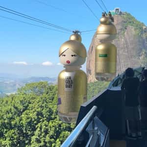Perfume Bottles Cable Car in a fake-out-of-home ad of Benetton Perfume