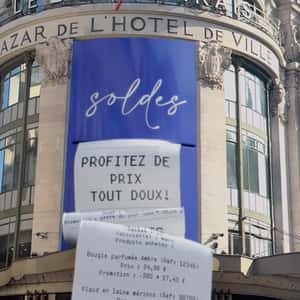 Receipt Rolls Out on Facade in a fake-out-of-home ad of Le BHV Marais