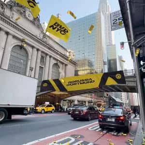 Yellow Confetti Rains in New York in a fake-out-of-home ad of Borussia Dortmund