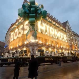 Building Turned into Christmas Gift in a fake-out-of-home ad of HIRMER MENSTYLE