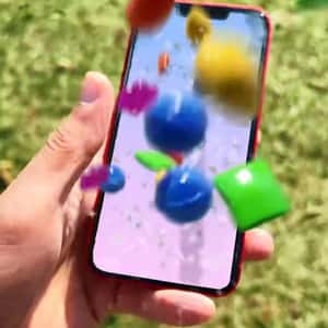 Candies Jump Out of Phone Screen in a fake-out-of-home ad of Candy Crush