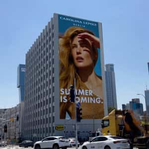 Building Wearing Sunglasses in a fake-out-of-home ad of Carolina Lemke