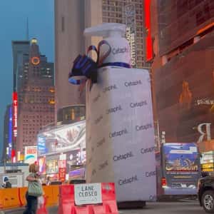 Wrapped Bottle Rolls at Times Square in a fake-out-of-home ad of Cetaphil