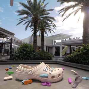 Clogs Rain Down at Shopping Center in a fake-out-of-home ad of Clogs