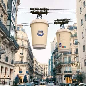 Coffee Cup Cable Cars in a fake-out-of-home ad of Cuvée Noire