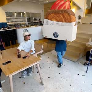 Massive Pastry Placed on Table in a fake-out-of-home ad of Diestro Cafe