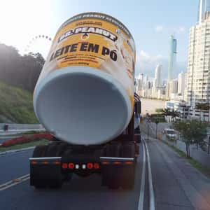 Containers Transported by Trucks in a fake-out-of-home ad of DR. PEANUT