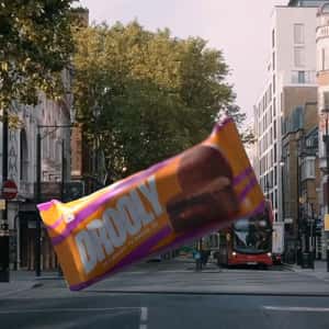 Chocolate Bar Lands on the Street in a fake-out-of-home ad of Drooly