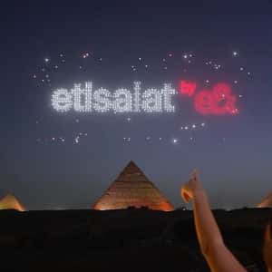 Drone Light Show at Pyramids of Giza in a fake-out-of-home ad of e& Egypt