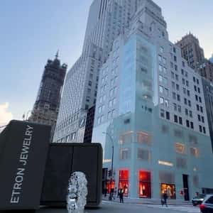 Jewelry Diamond Ring Rolls in a fake-out-of-home ad of Etron Jewelry