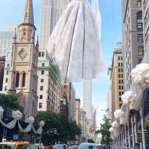 Bridal Gown Hangs from Helicopter in a fake-out-of-home ad of Eva Lendel