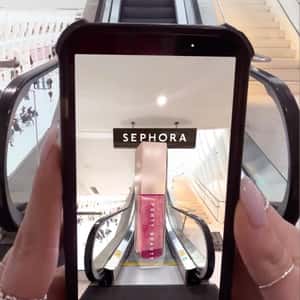 Beauty Products Visible on Phone in a fake-out-of-home ad of Sephora