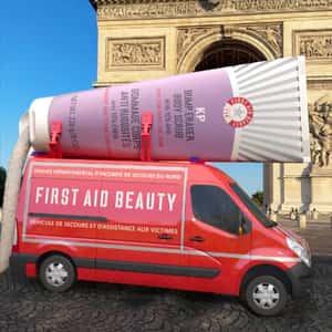 Body Scrub Polishes the Road in a fake-out-of-home ad of First Aid Beauty