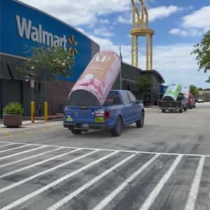 Cocktail Cans Loaded on Trucks in a fake-out-of-home ad of Free AF
