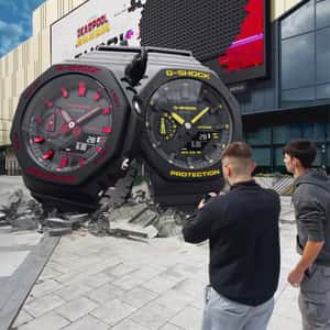 Watches Emerges from Digital Screen in a fake-out-of-home ad of G-SHOCK