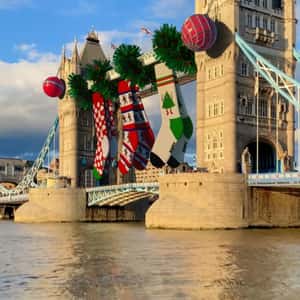 Bridge Adorned with Holiday Socks in a fake-out-of-home ad of Holiday Socks