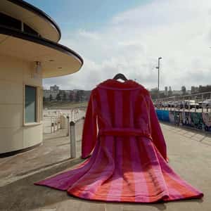 Robe on Hanger Walks the Street in a fake-out-of-home ad of Hommey